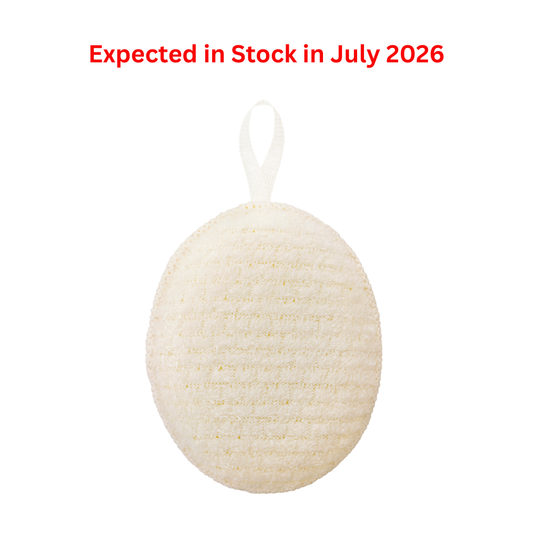 Round beige bath sponge with a white string on a white background, text indicating stock availability in July 2026.